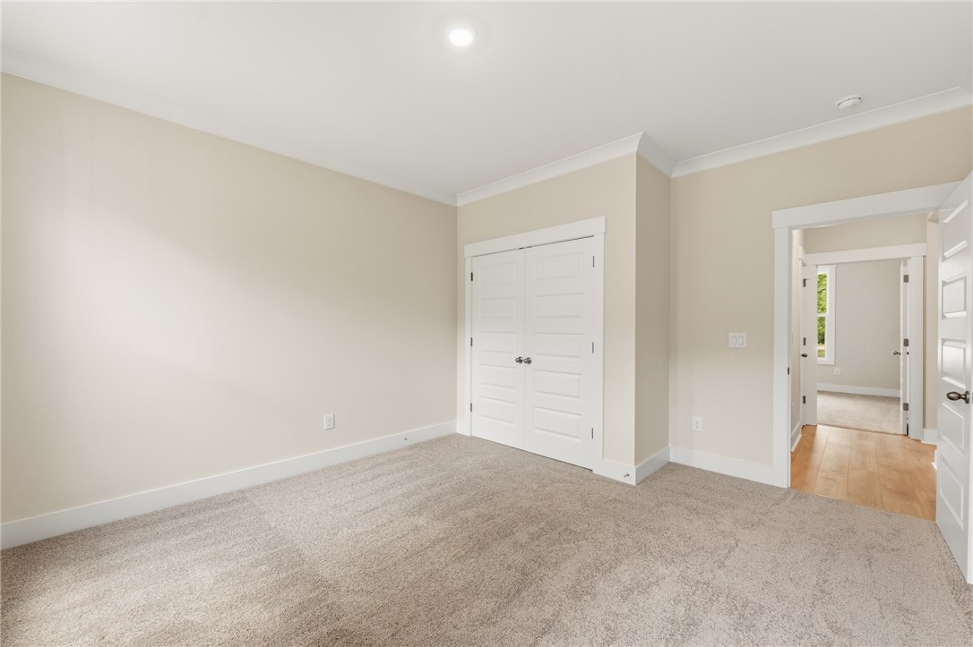 203 Timothy Court Anderson, SC 29621 - Photo 16 of 40 A pristine bedroom, ready for personalization, features plush carpeting and a spacious closet.