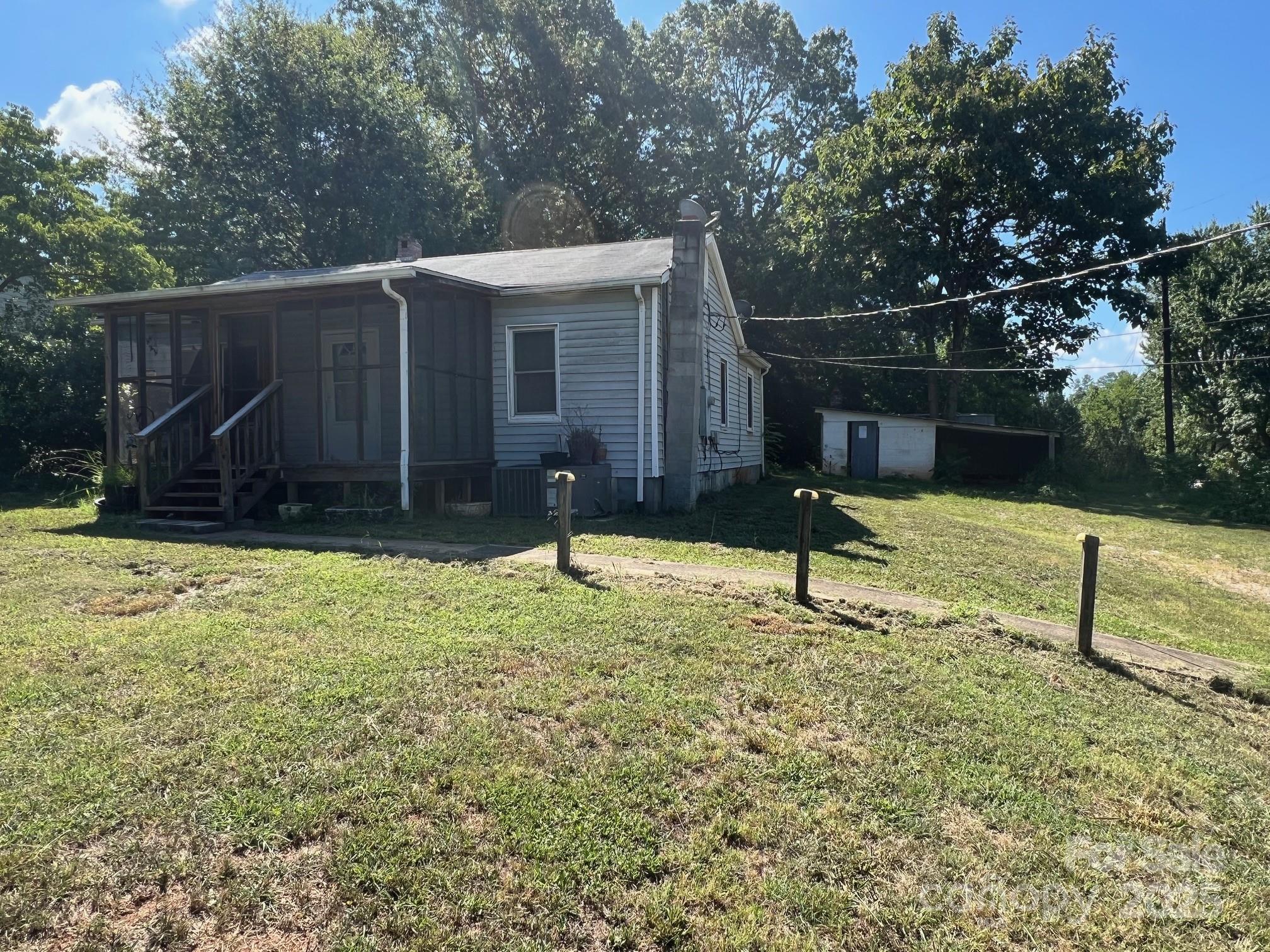 295 D D. Mathis Drive Rutherfordton, NC 28139 - Photo 1 of 11 a house view with a backyard space