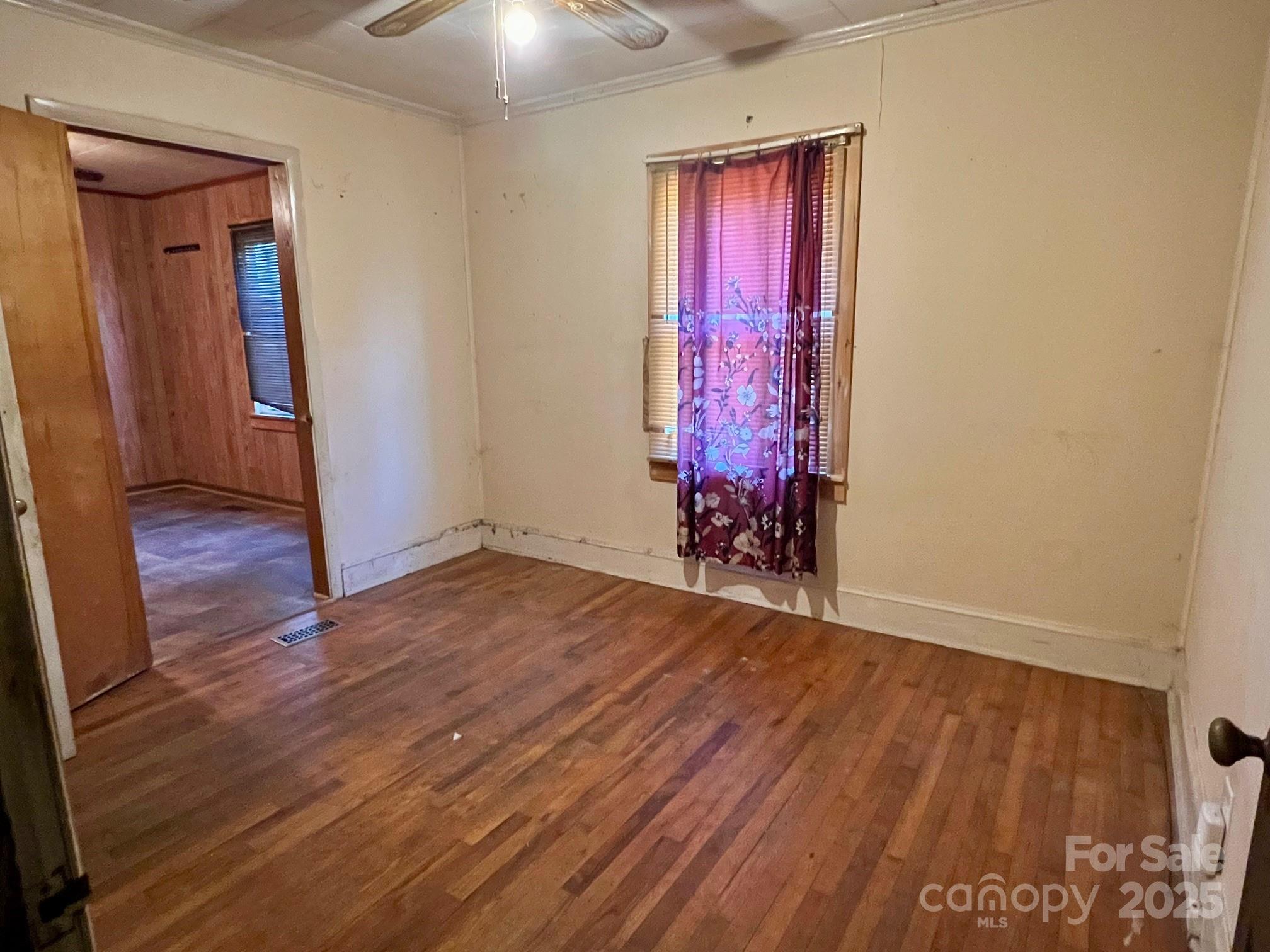 295 D D. Mathis Drive Rutherfordton, NC 28139 - Photo 8 of 11 an empty room with wooden floor and closet