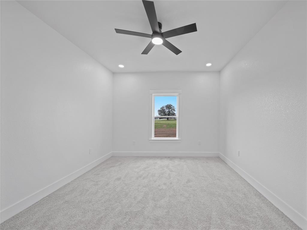 145 Cartwright Park Road Weatherford, TX 76087 - Photo 24 of 27 an empty room with a window