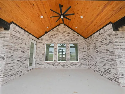 a view of entryway with a front door
