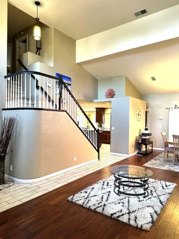 a view of entryway livingroom and hall