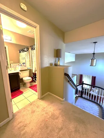 a room with furniture and a wooden floor