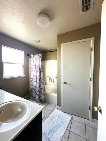 a view of empty room with a window