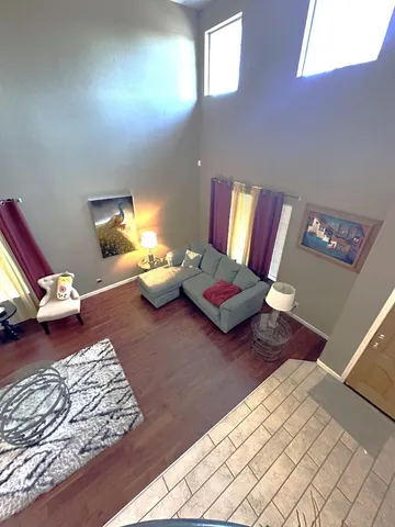 a view of an chairs in the balcony