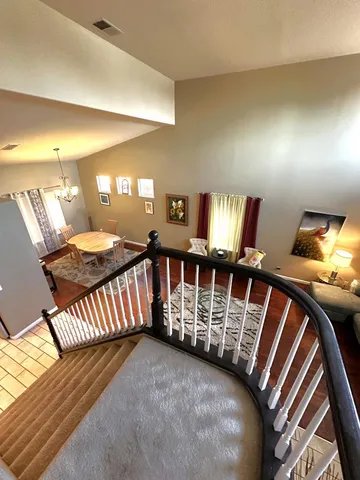 a view of a patio filled with furniture