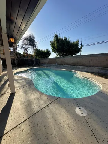 a view of a house with entertaining space