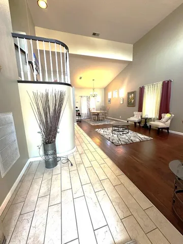 a view of kitchen with furniture and window