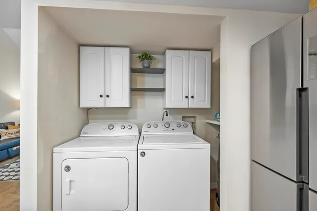 a utility room with dryer and washer