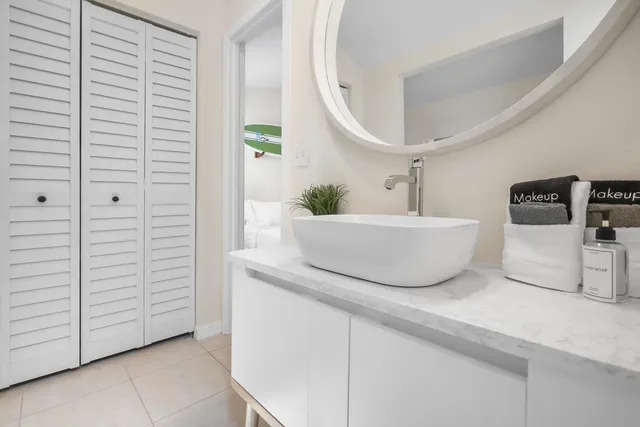 a bathroom with a bathtub and a sink