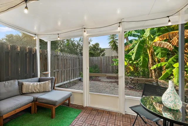 a outdoor living space with furniture and a garden