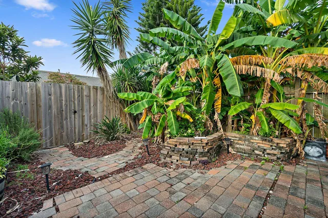 an aerial view of residential building and lake