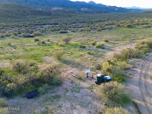 a view of an ocean and mountain