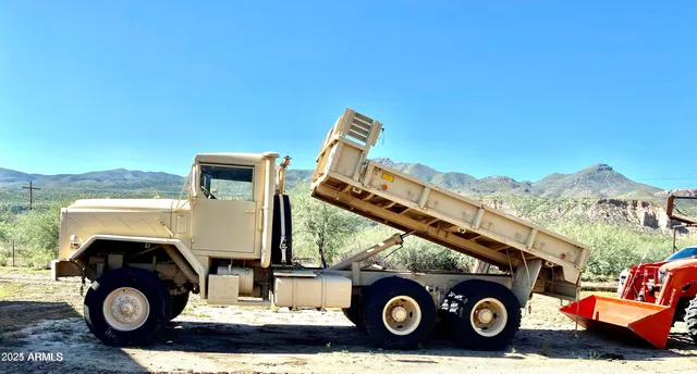 a view of swimming pool with a sitting space