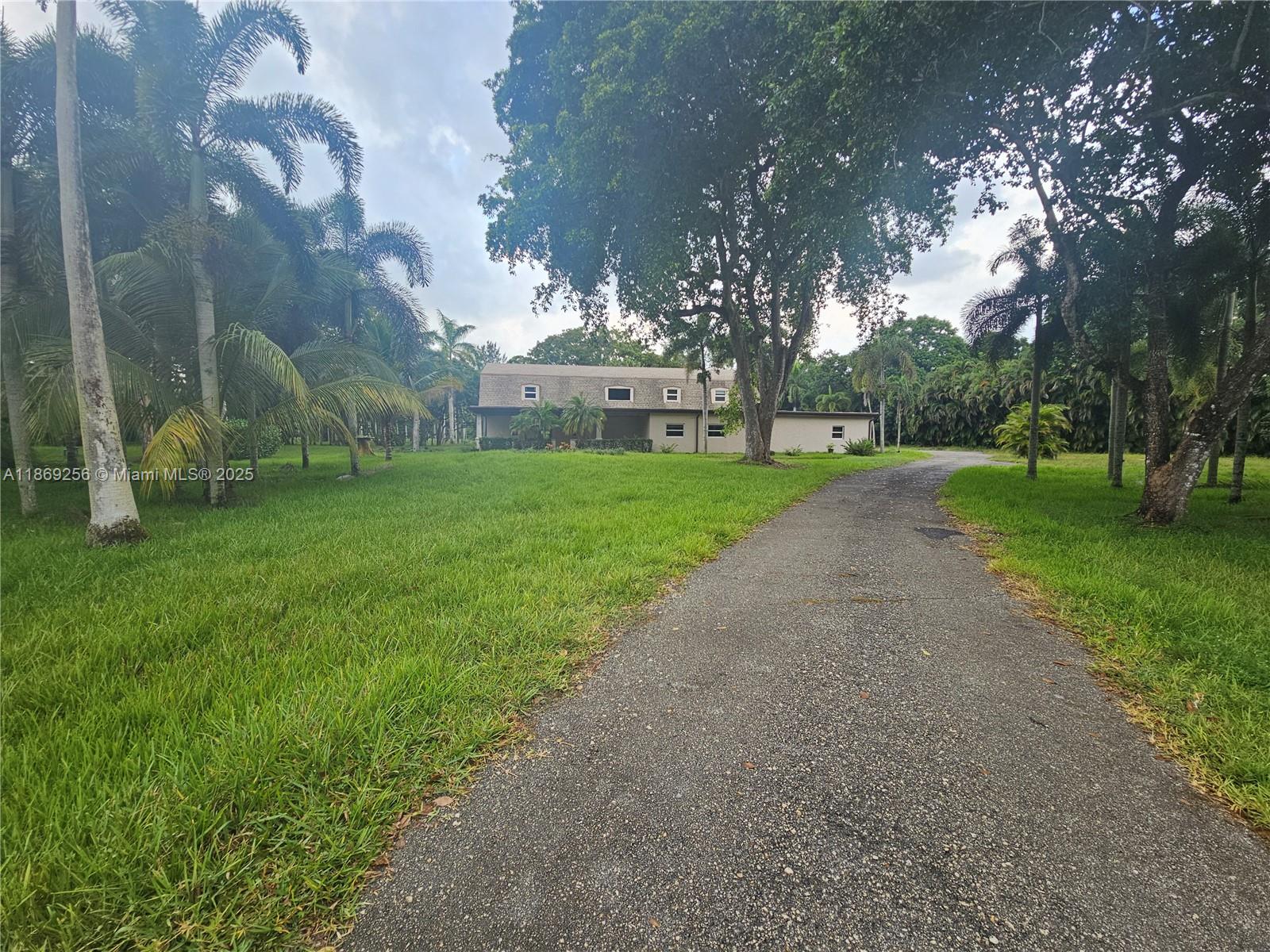 15101 Southwest 27th Street Davie, FL 33331 - Photo 15 of 43 a view of a park with large trees