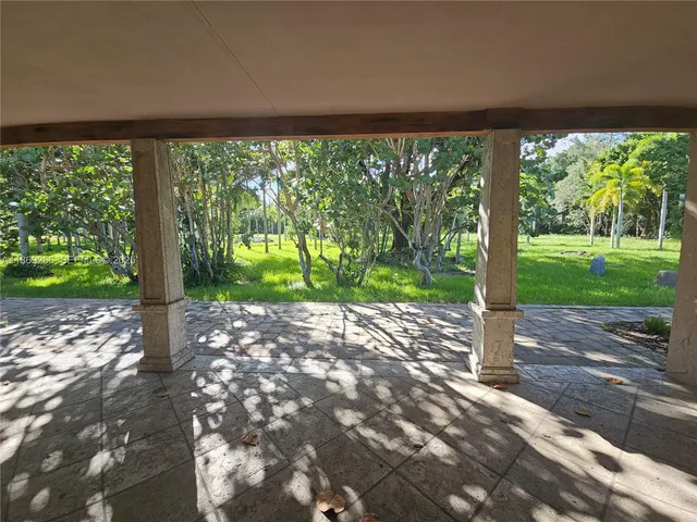 a view of a garden with a pathway