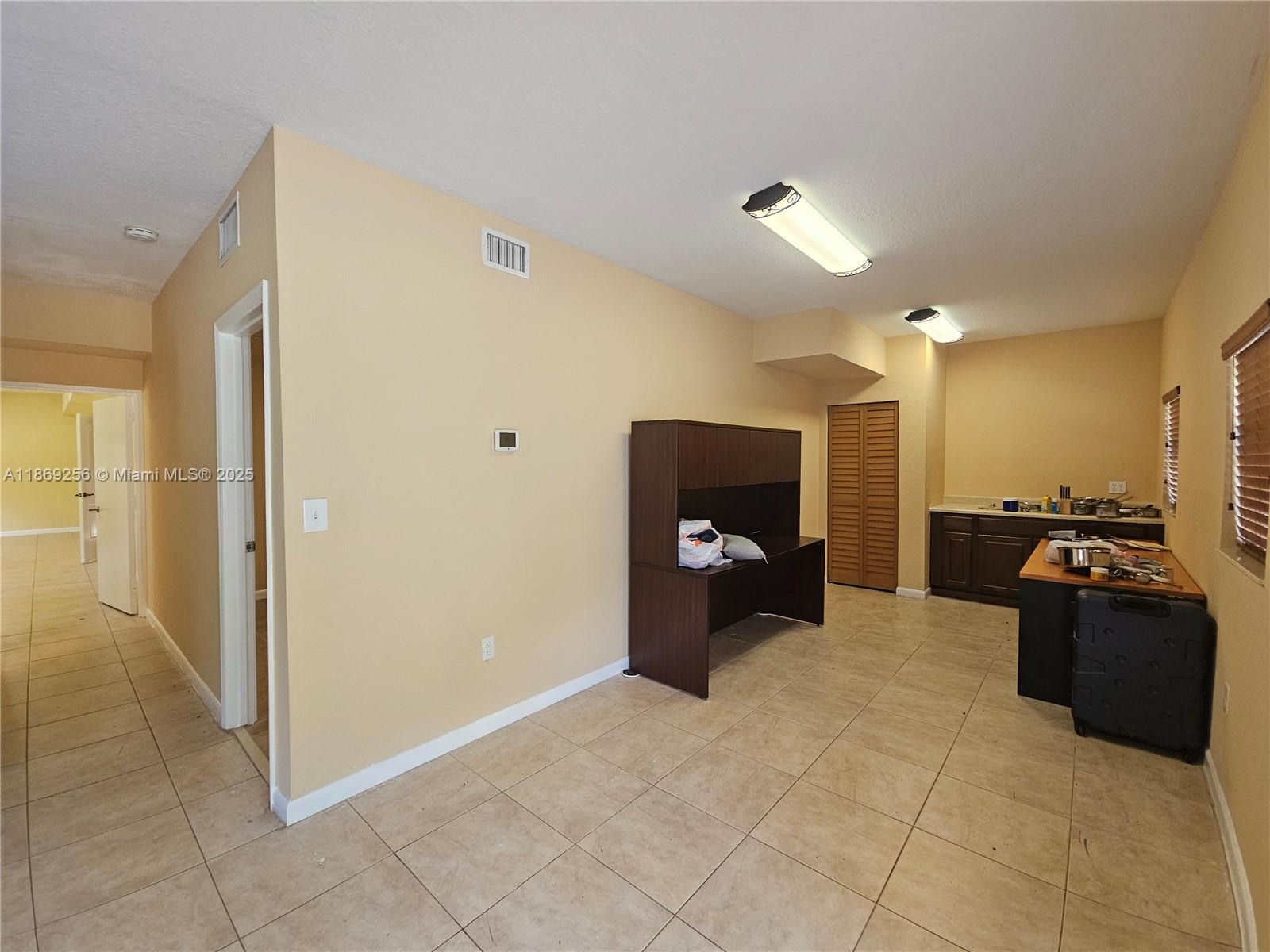 15101 Southwest 27th Street Davie, FL 33331 - Photo 35 of 43 a living room with furniture