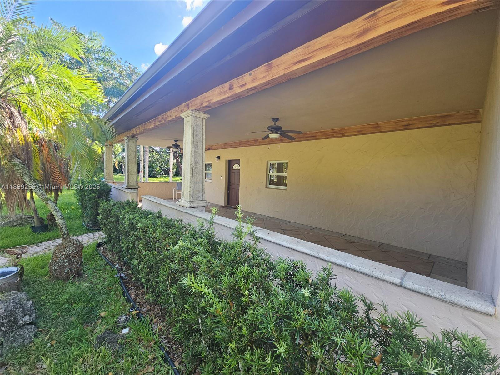 15101 Southwest 27th Street Davie, FL 33331 - Photo 5 of 43 a view of a backyard with plants