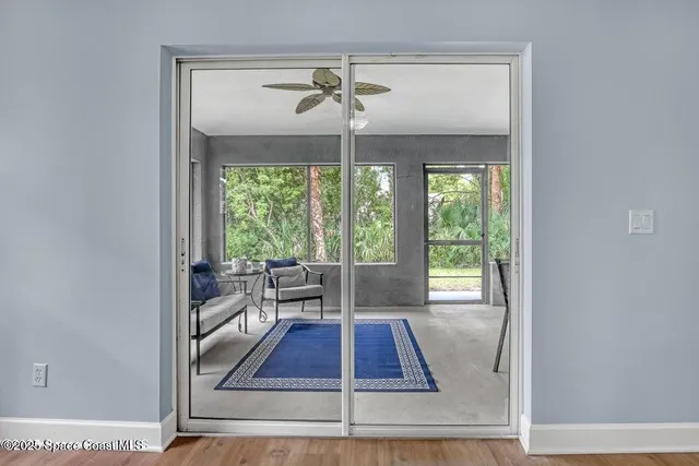 a view of a living room and a window