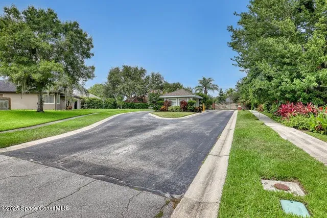 a view of a street with a houses