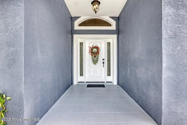 a view of a entryway door of the house
