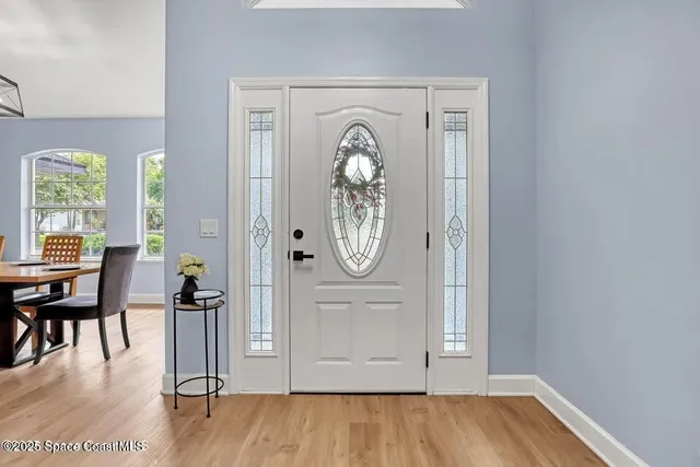 a view of livingroom with furniture and wooden floor