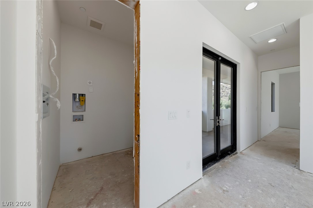 1140 Julie Road Henderson, NV 89002 - Photo 54 of 71 Ready for appliances, a dedicated laundry area awaits personal touches.