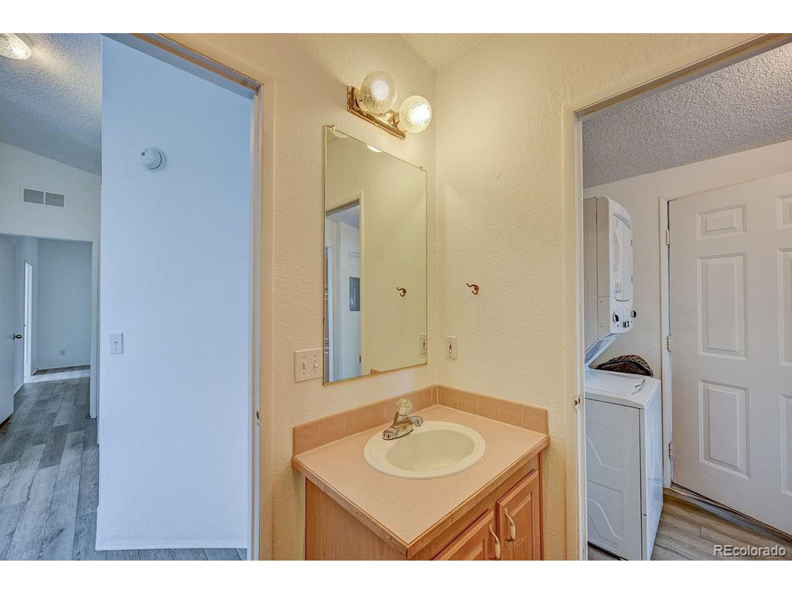 121 Brookdale Avenue Buena Vista, CO 81211 - Photo 24 of 50 a bathroom with a sink and a mirror