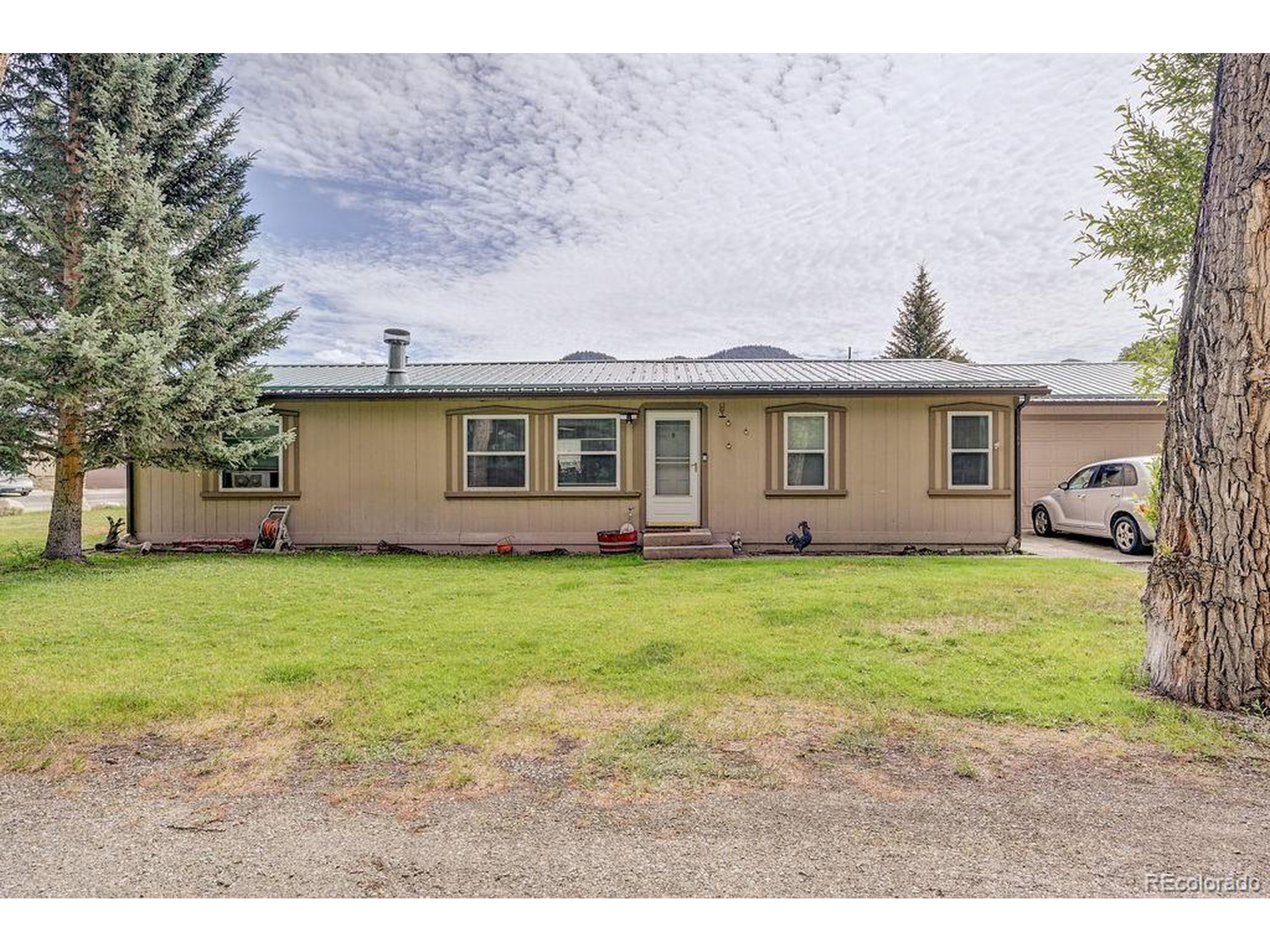 121 Brookdale Avenue Buena Vista, CO 81211 - Photo 50 of 50 a view of outdoor space yard and front view of a house
