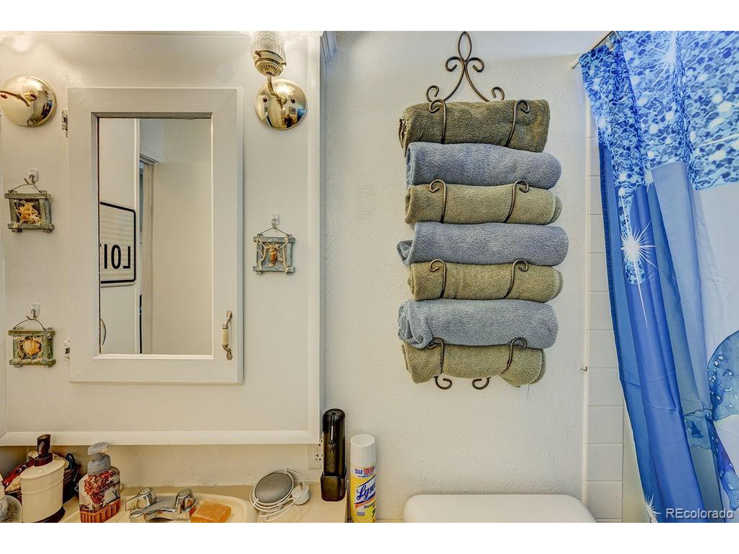 121 Brookdale Avenue Buena Vista, CO 81211 - Photo 10 of 50 a bathroom with a sink and a mirror
