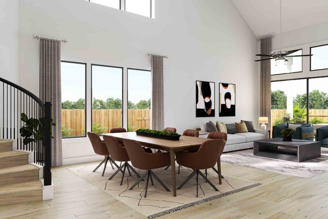 7926 Antler Rdg Drive Fulshear, TX 77441 - Photo 3 of 11 a view of a dining room with furniture window and wooden floor