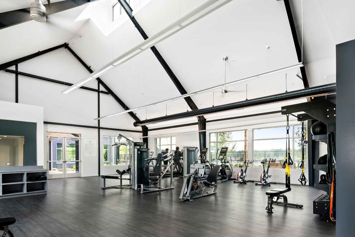 7926 Antler Rdg Drive Fulshear, TX 77441 - Photo 5 of 11 a view of a room with lots of gym equipment