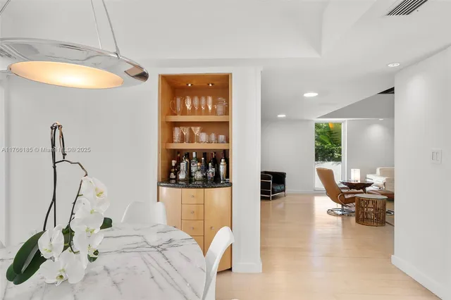 a view of a livingroom with furniture and windows