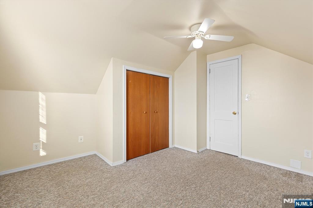 62 Johnson Avenue Wallington, NJ 07057 - Photo 15 of 25 a view of an empty room with a ceiling fan