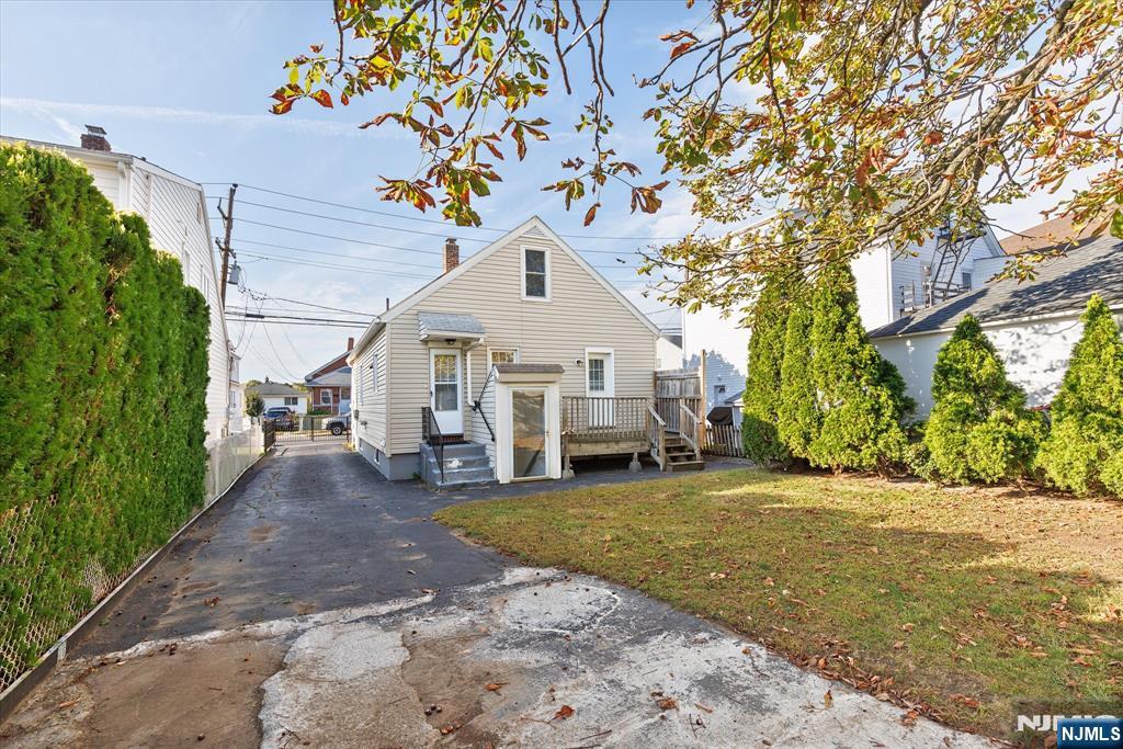 62 Johnson Avenue Wallington, NJ 07057 - Photo 24 of 25 a view of a house with a yard
