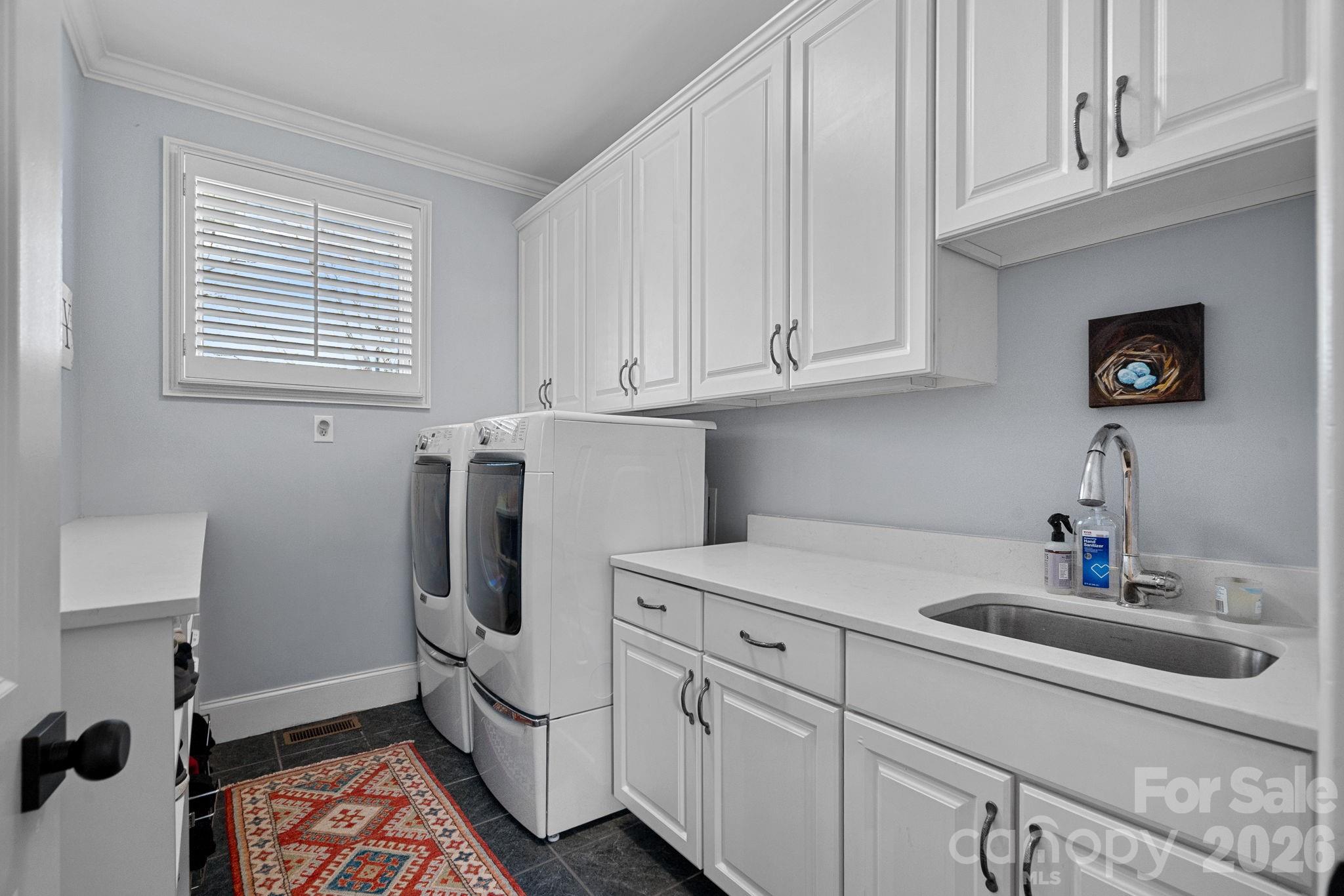 19016 Wildcat Trail Davidson, NC 28036 - Photo 21 of 48 a room with cabinets and window