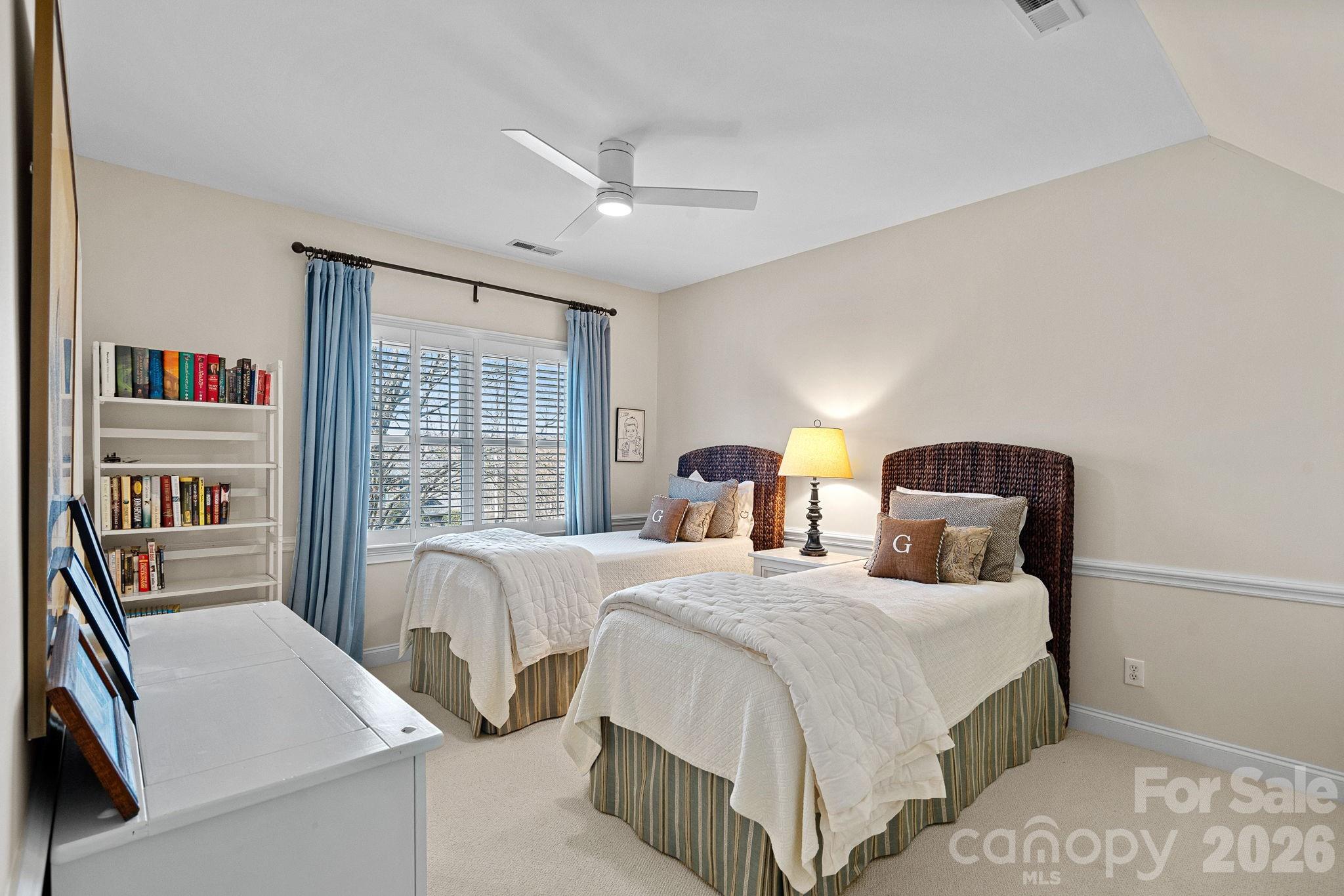 19016 Wildcat Trail Davidson, NC 28036 - Photo 34 of 48 a bedroom with two beds and a large window