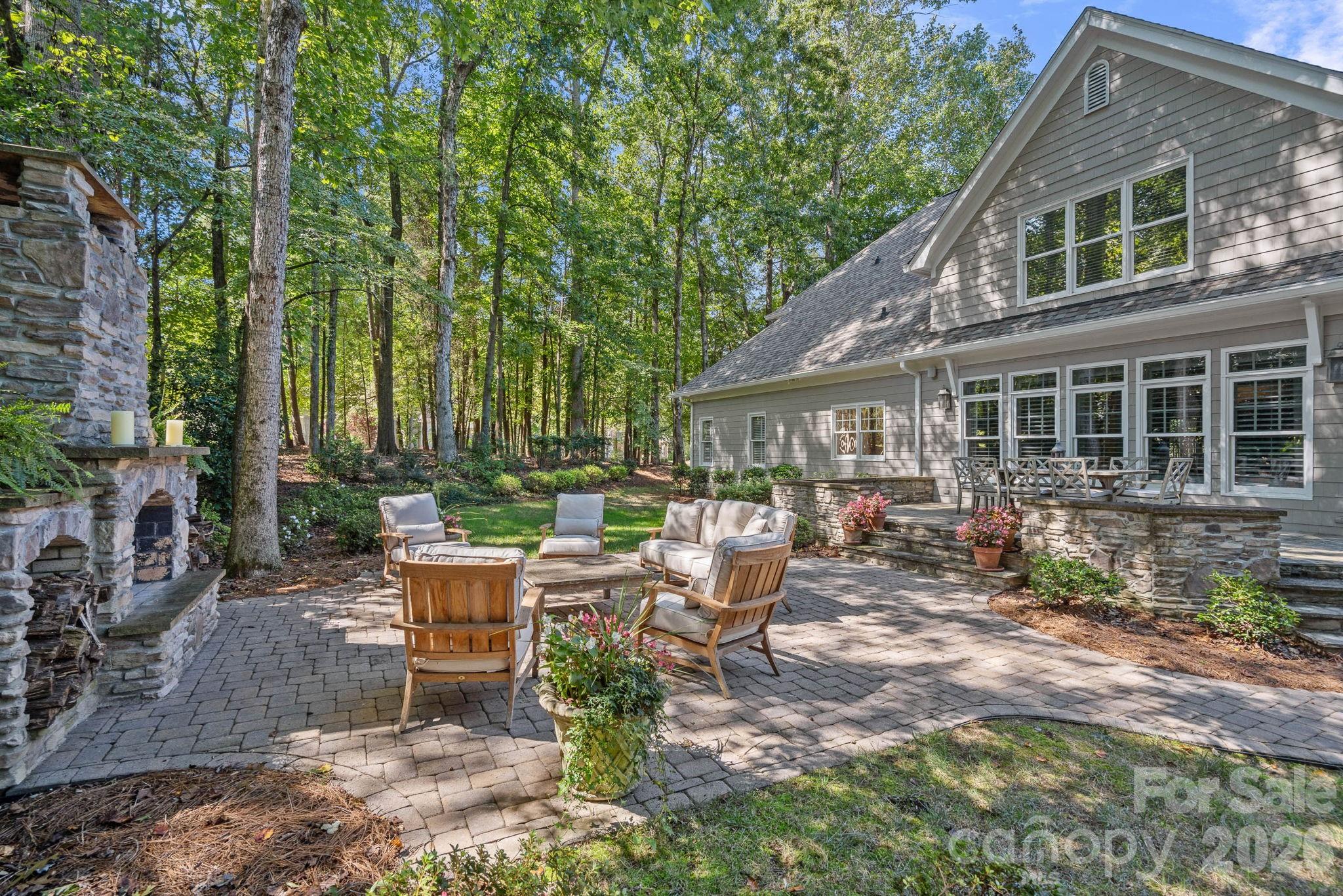 19016 Wildcat Trail Davidson, NC 28036 - Photo 37 of 48 a view of backyard with outdoor seating and plants