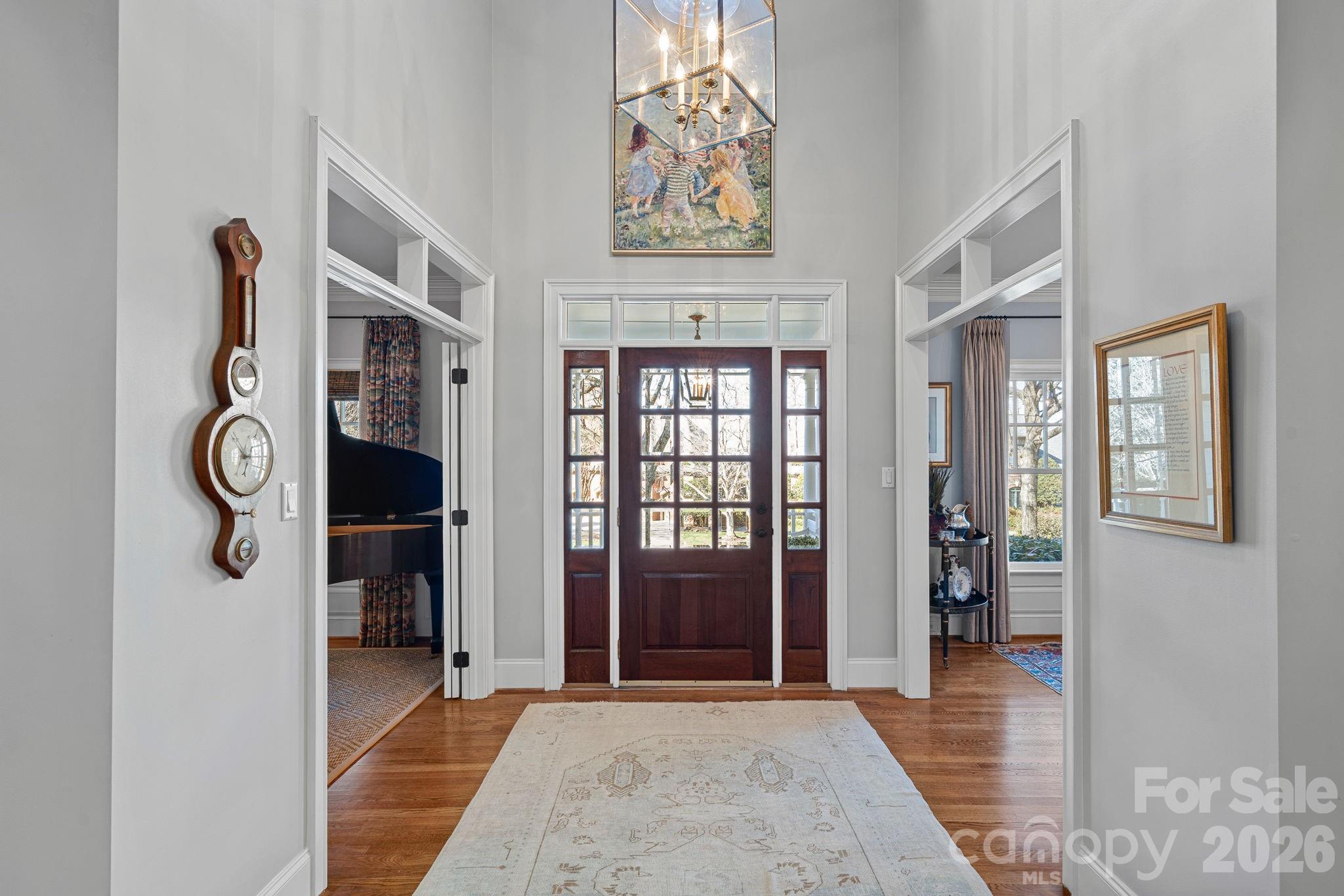 19016 Wildcat Trail Davidson, NC 28036 - Photo 5 of 48 a view of an entryway with wooden floor