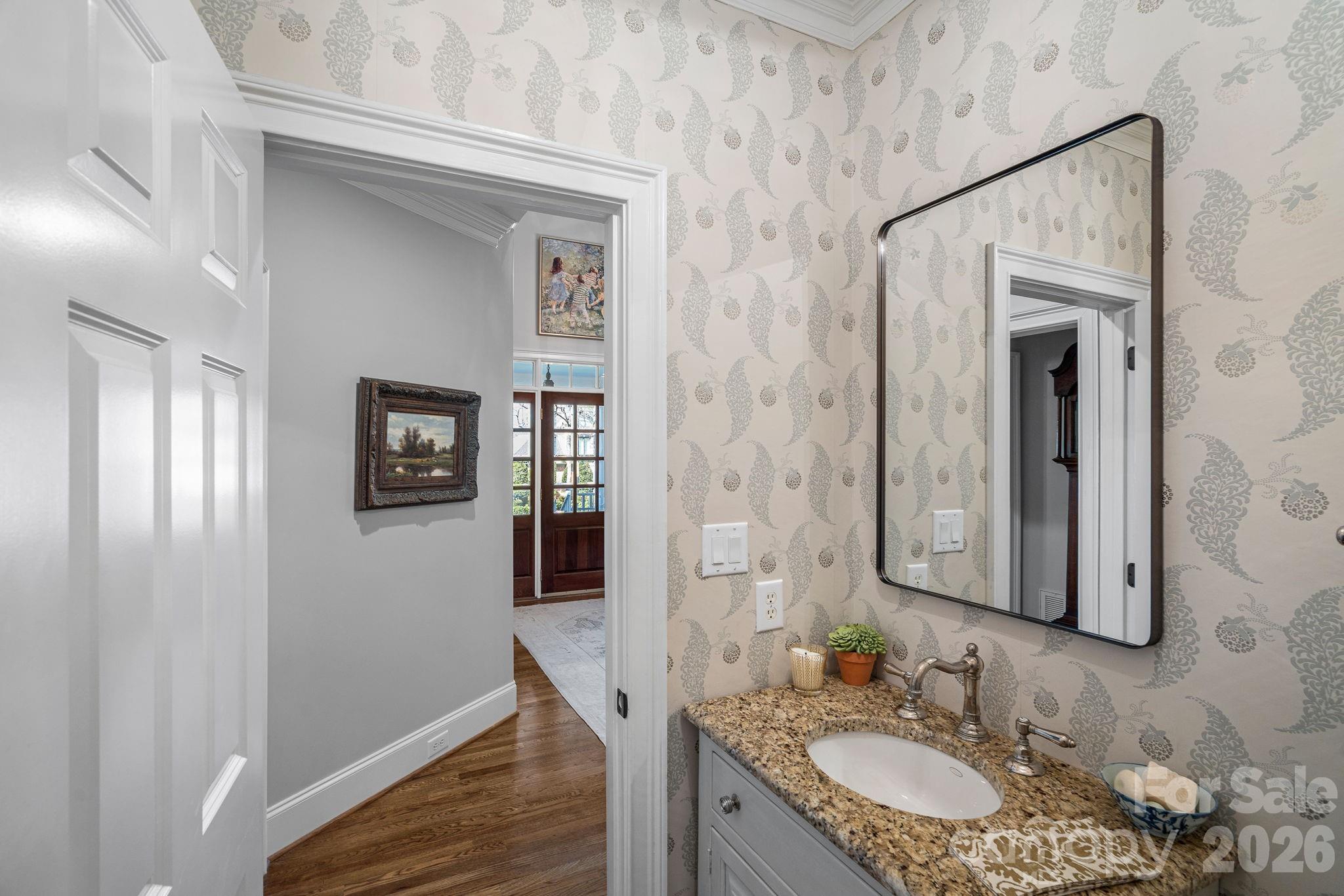 19016 Wildcat Trail Davidson, NC 28036 - Photo 10 of 48 a bathroom with a granite countertop sink and a mirror