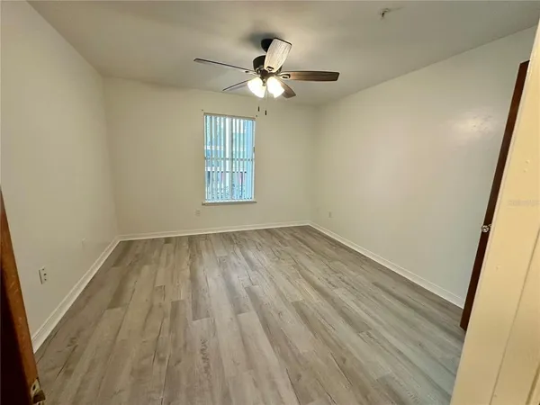 a view of small space with wooden floor