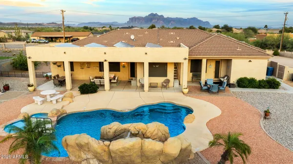 a front view of a house with swimming pool