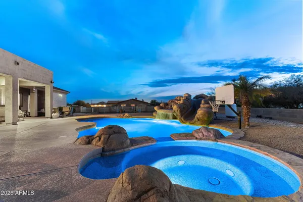 a view of swimming pool from a balcony