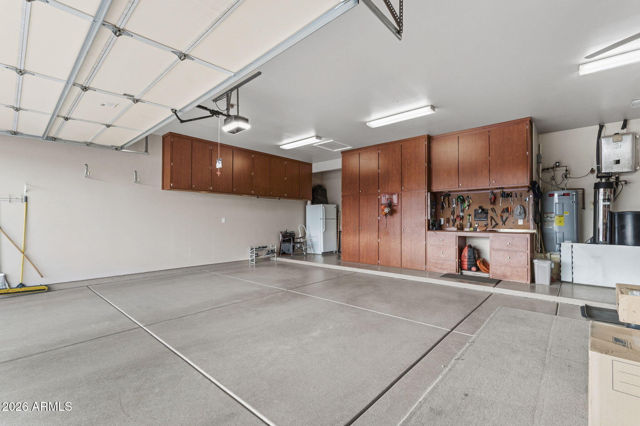 1104 North Mountain Road Mesa, AZ 85207 - Photo 41 of 44 3 Car Garage with cabinets