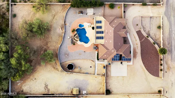 an aerial view of a swimming pool