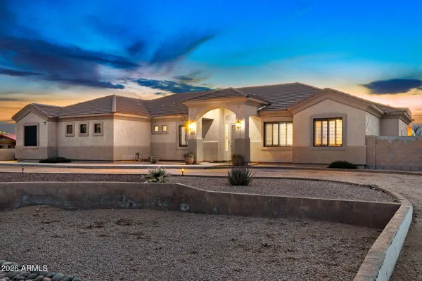 a view of a house with entertaining space
