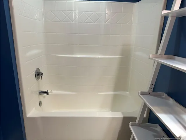 a bathroom with a bathtub