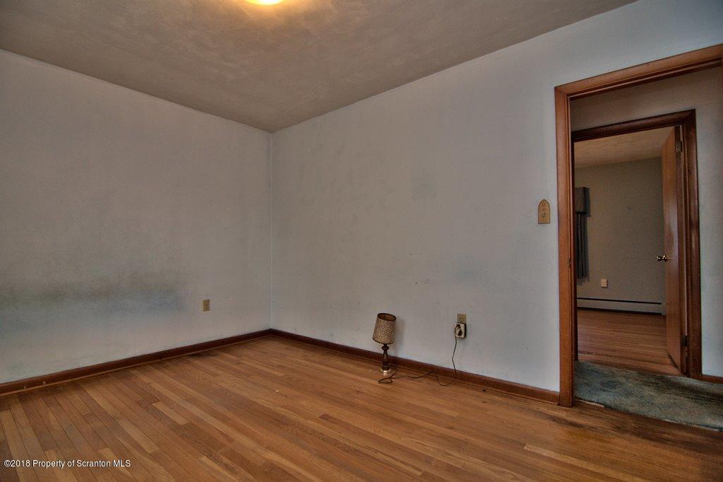 1073 Mt Cobb Road Lake Ariel, PA 18436 - Photo 14 of 22 a view of an empty room and wooden floor