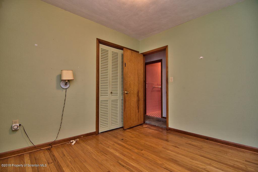 1073 Mt Cobb Road Lake Ariel, PA 18436 - Photo 16 of 22 a view of a room with wooden floor