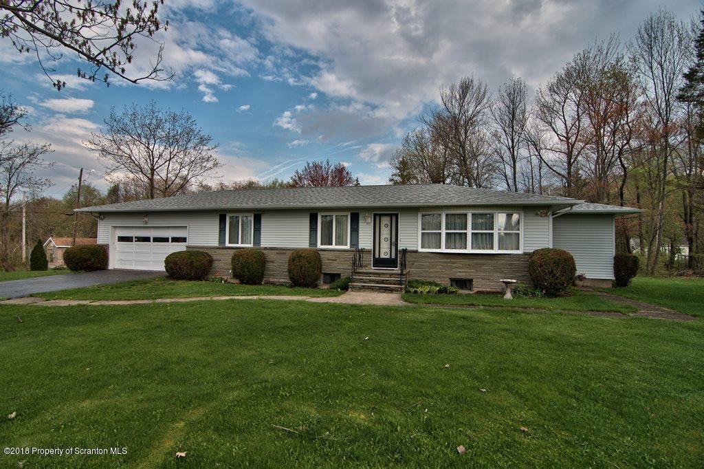 1073 Mt Cobb Road Lake Ariel, PA 18436 - Photo 19 of 22 a front view of a house with a yard